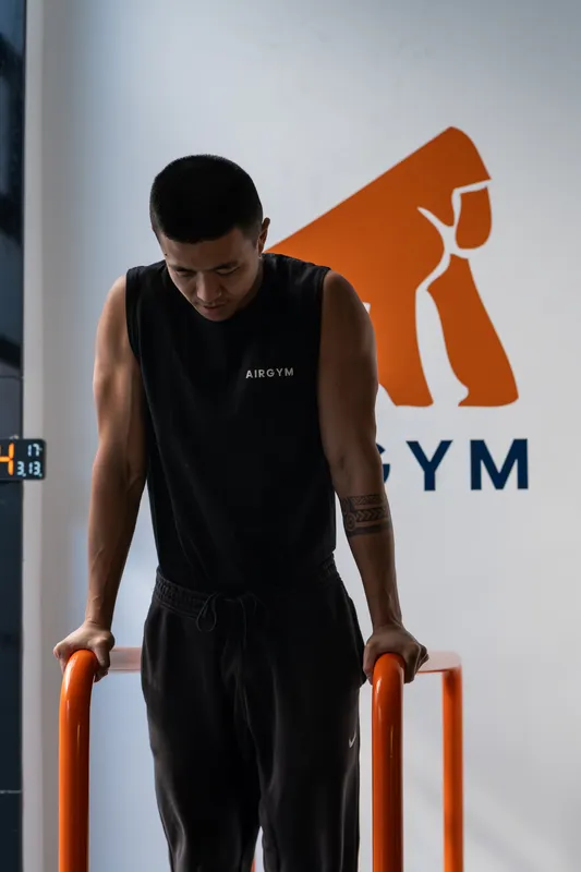 Xian Lai Jin, entrenador de calistenia y cofundador de Airgym
